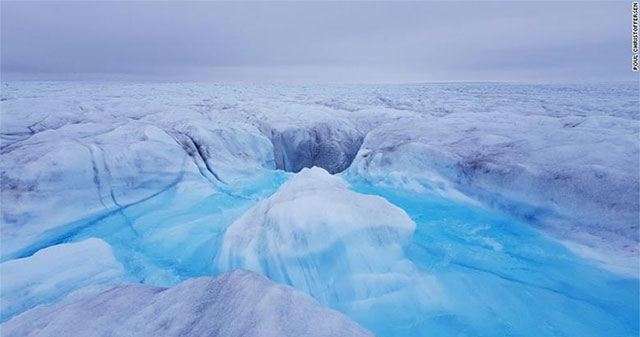 The ice in Greenland melts from bottom to top, faster than ever