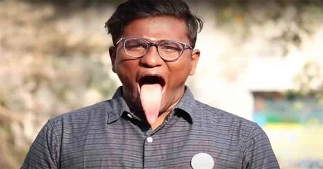 The man with the longest tongue in the world, curved through the roof of his mouth into the nasal cavity