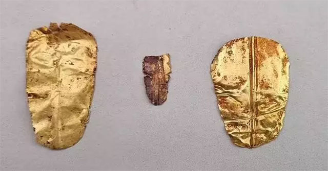 The mummy of a 2,500-year-old man and woman with a golden tongue scares grave robbers