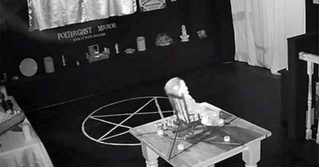 The scene of 'ghost doll' swinging by itself at a museum in the UK