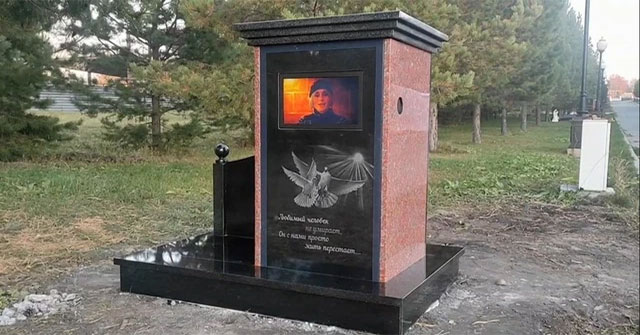 This is the first grave to install a TV to show videos of the deceased