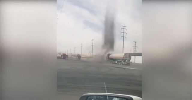 Video: Tanker truck driver 'defeats' water cannon in a flash