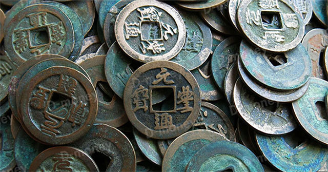 Why did ancient tomb robbers refuse to steal coins from ancient tombs?