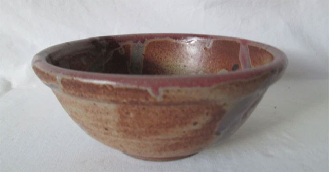 Why do Chinese people break an earthen pot before raising the coffin to bury it?