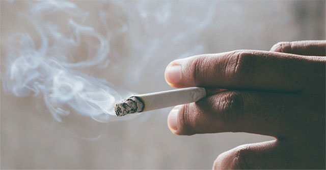 Why do many longtime smokers not get lung cancer?