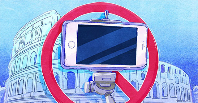 Why do many museums and aquariums ban tourists from taking photos?