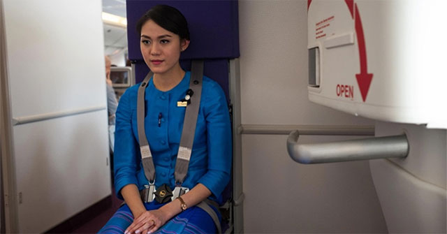 Why do pilots and flight attendants always wear different seat belts than passengers?