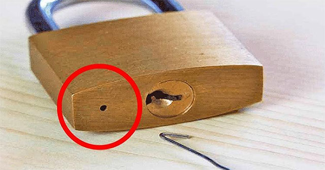 Why does every lock have a 'mysterious' small hole at the bottom?