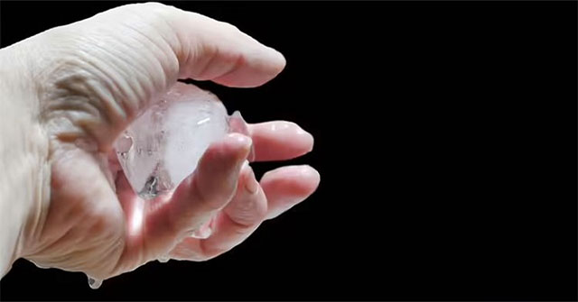 Why does ice stick to your hands when you hold it?