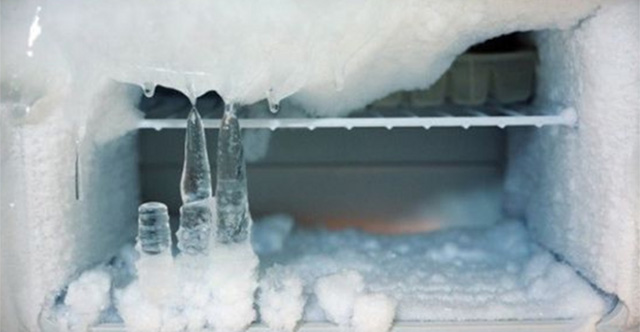 Why does the refrigerator freeze and should this layer of snow be removed?