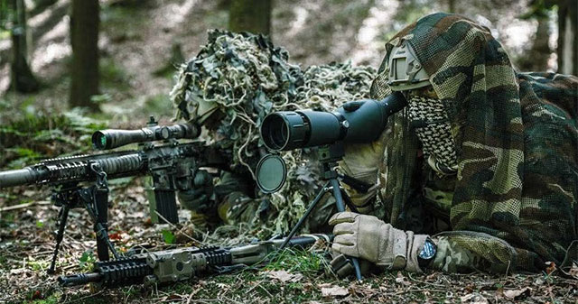 Why when withdrawing, snipers can drop their guns but have to keep their sights?