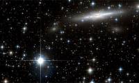 400 galaxies, including our own, are being drawn toward a mysterious
