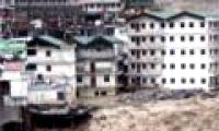 65 people were killed by flooding and landslides in India