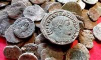 A badger dug up 200 ancient coins dating back to Roman times, but scientists 'confiscated' them all