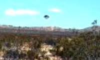 A clear picture of a UFO near a military base