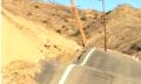 A severely deformed California street with no known cause