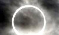 Admire partial eclipse across Asia