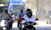 Artificial rain reduces dust on the street