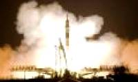 Astronauts bring Christmas gifts into the universe