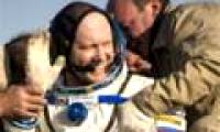 Astronauts return to Earth safely