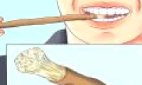 Before having a toothbrush, how did the old people clean their teeth?