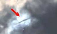 Captured the image of a 'flying saucer' passing by and then disappearing right at the time of the total solar eclipse