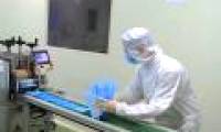 Close-up of the process of producing medical masks