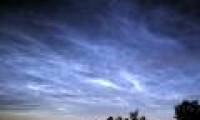 Clouds glow in the night