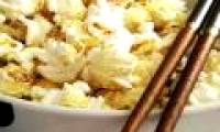 Eating popcorn with chopsticks, turns out the secret of happiness is simply that