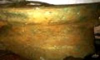 Excavate the house, discover ancient 2-year-old bronze drum