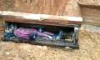 Excavating an ancient tomb containing an intact male human body suspected of being an ancient Chinese aristocrat