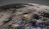 First detection of traces of CO2 and H2O2 on the surface of the moon Charon