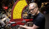 Former MC of science show MythBusters turns a nerf gun into a 'double-barreled hat', releasing 54 bullets in the blink of an eye