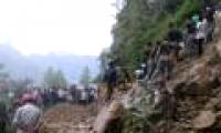 Heavy rain in India caused landslides that left 14 people dead