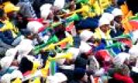 How was the bustling atmosphere in the stadium created?