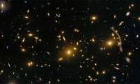 Hubble has discovered a 'mysterious golden dragon' 4 billion light-years away, spanning 5 galaxies!