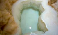 Jade-green lake inside strange cave in America