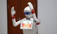 Military school instructors build robots that can dance and sing and teach English