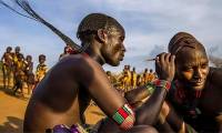 Primitive tribe living in deep forest, maintaining the custom of giving birth like hens lay eggs