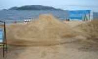 Sculpture in the sand because of the green planet