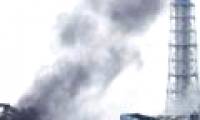 Smoke, steam rising from 2 Japanese reactors