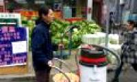 Street artist with brick dust pollution in Beijing