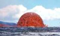The 20-meter-high lava tower is red in the sea