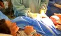 The baby comes out of the womb during a natural caesarean section