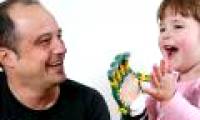 The engineer brings his hands to the disabled children