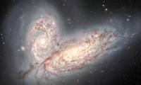 The latest images of galaxies spiraling together.