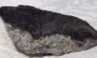 The meteorite of the Earth age falls ... the roof