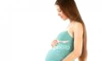 The pregnant woman is worried about her child easily getting asthma