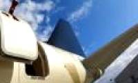 The reason for not being able to open the airplane door in mid-air