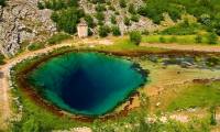 The strange blue 'eye' of the 101km long river